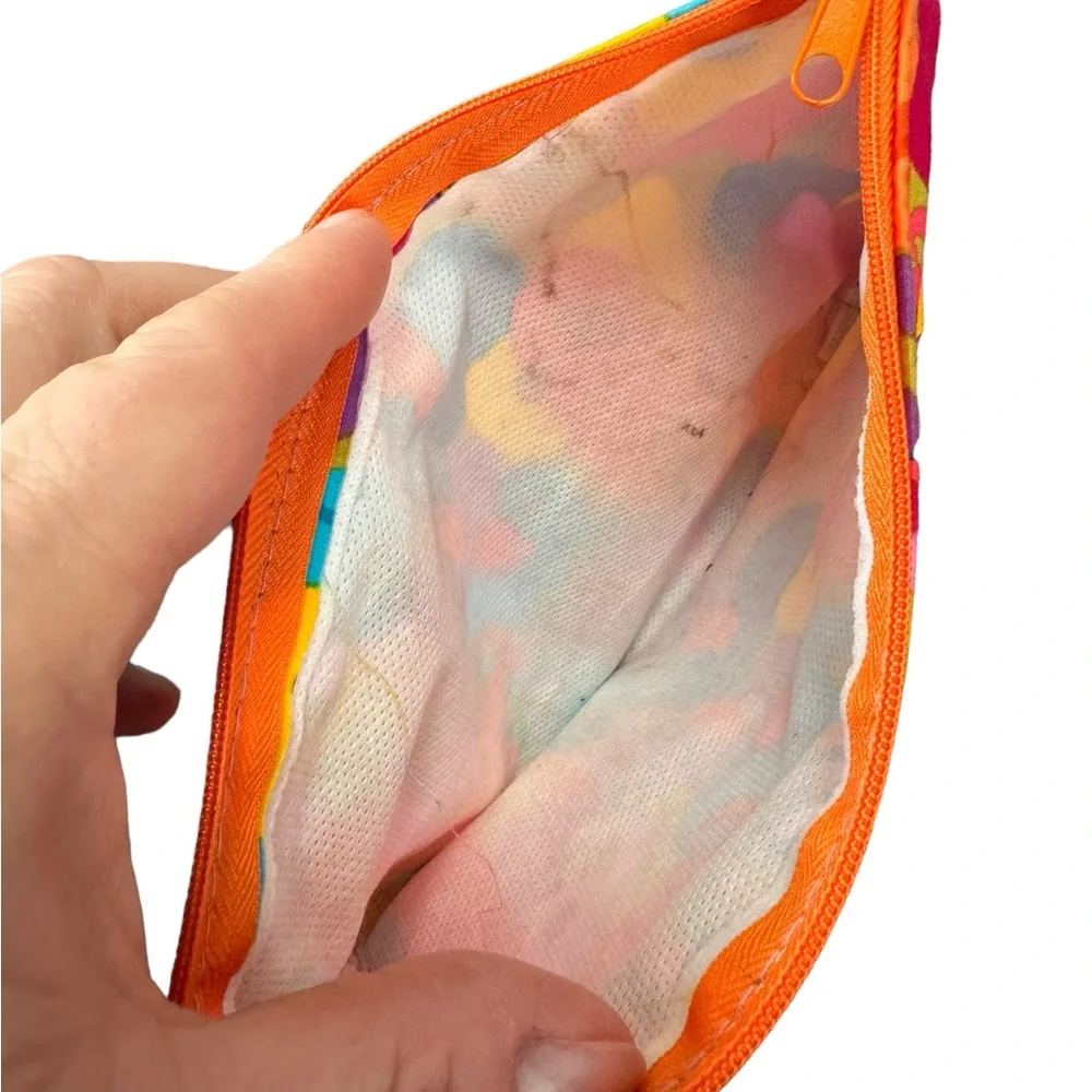 Cute cotton pouch with a bright multicolored elephant pattern. Gently used.